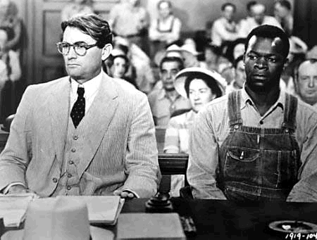 Gregory Peck (left) and Brock Peters in a pivotal scene from the 1962 film "To Kill a Mockingbird." Photo courtesy of Wikimedia Commons. 