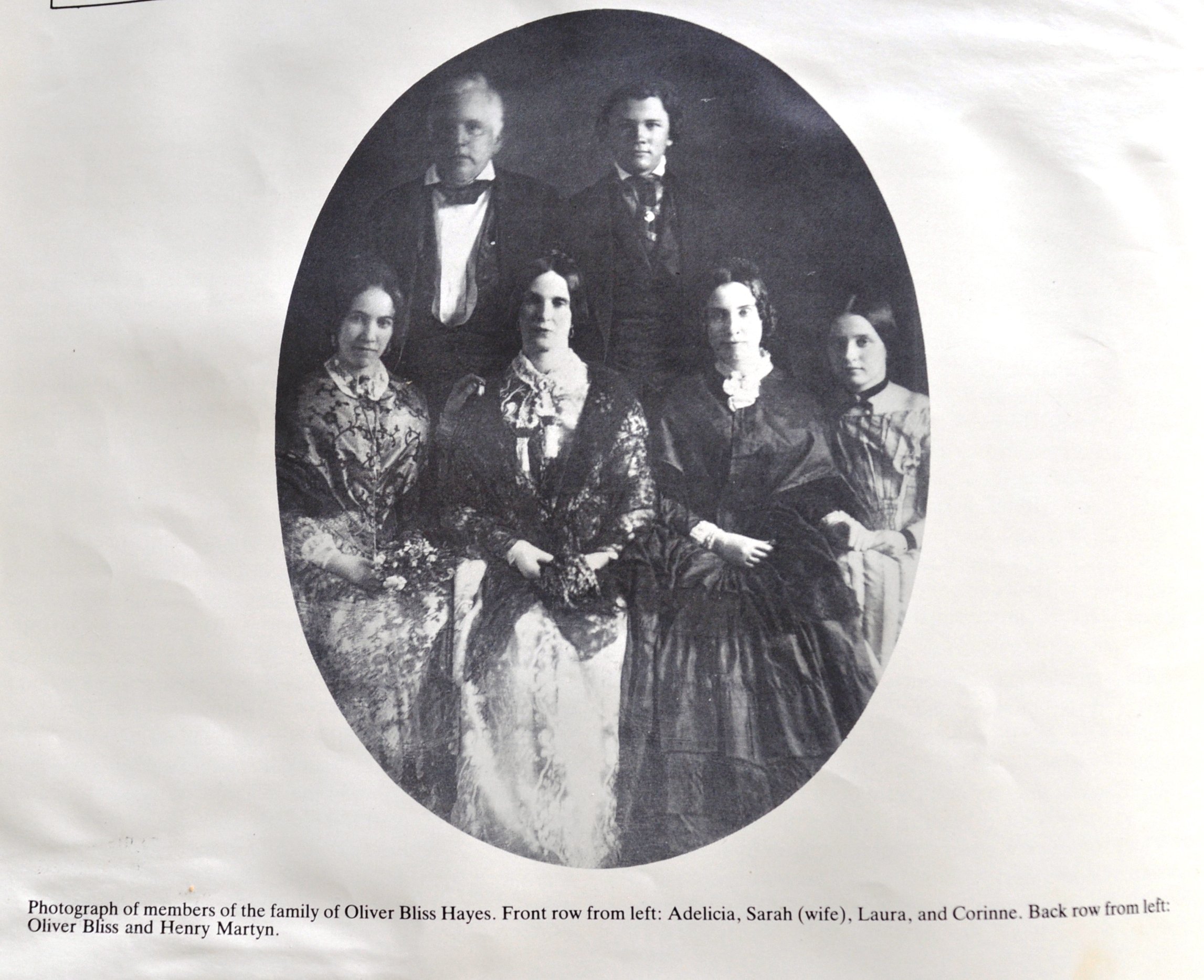 A photo of the author's ancestors. Adelicia is pictured on the far left while Corinne is on the far right.