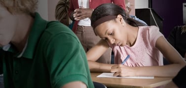 Slider_student_writing-1.jpg Slider_student_writing-1.jpg